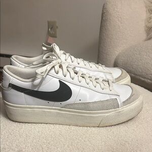 Nike White and Gray Sneakers with Black Swoosh